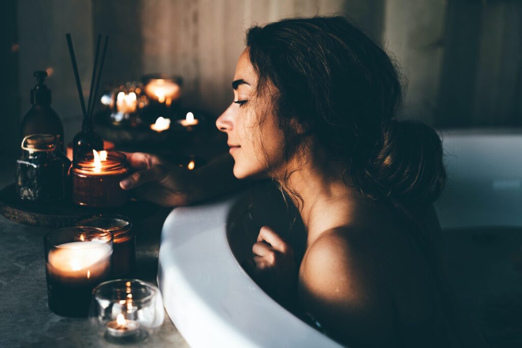 Beautiful woman relaxing at spa. Young lady relaxing in jacuzzi.